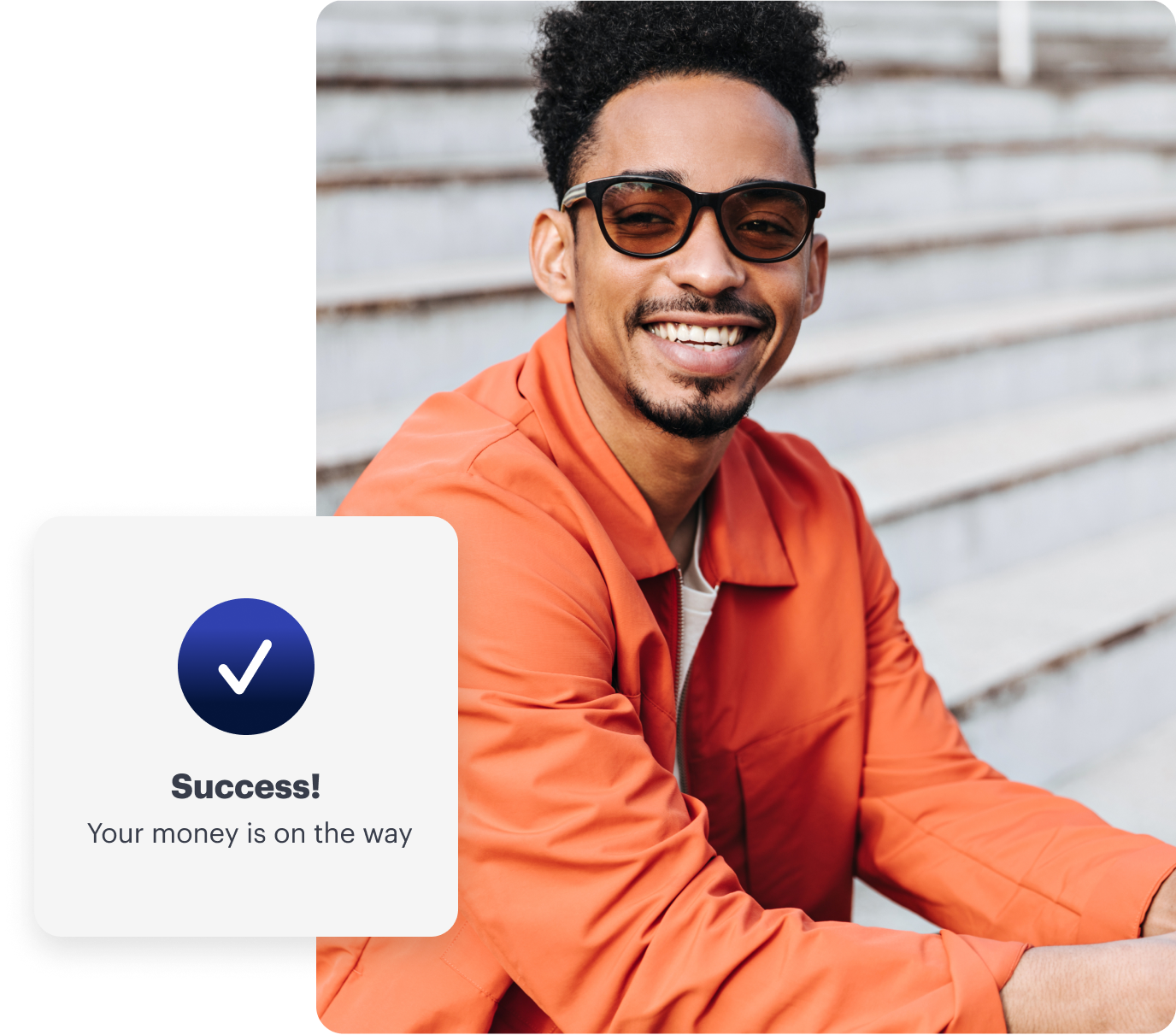 A person smiling, sitting on steps, wearing glasses and an orange jacket. On the left, a message reads: “Success! Your money is on the way.”.